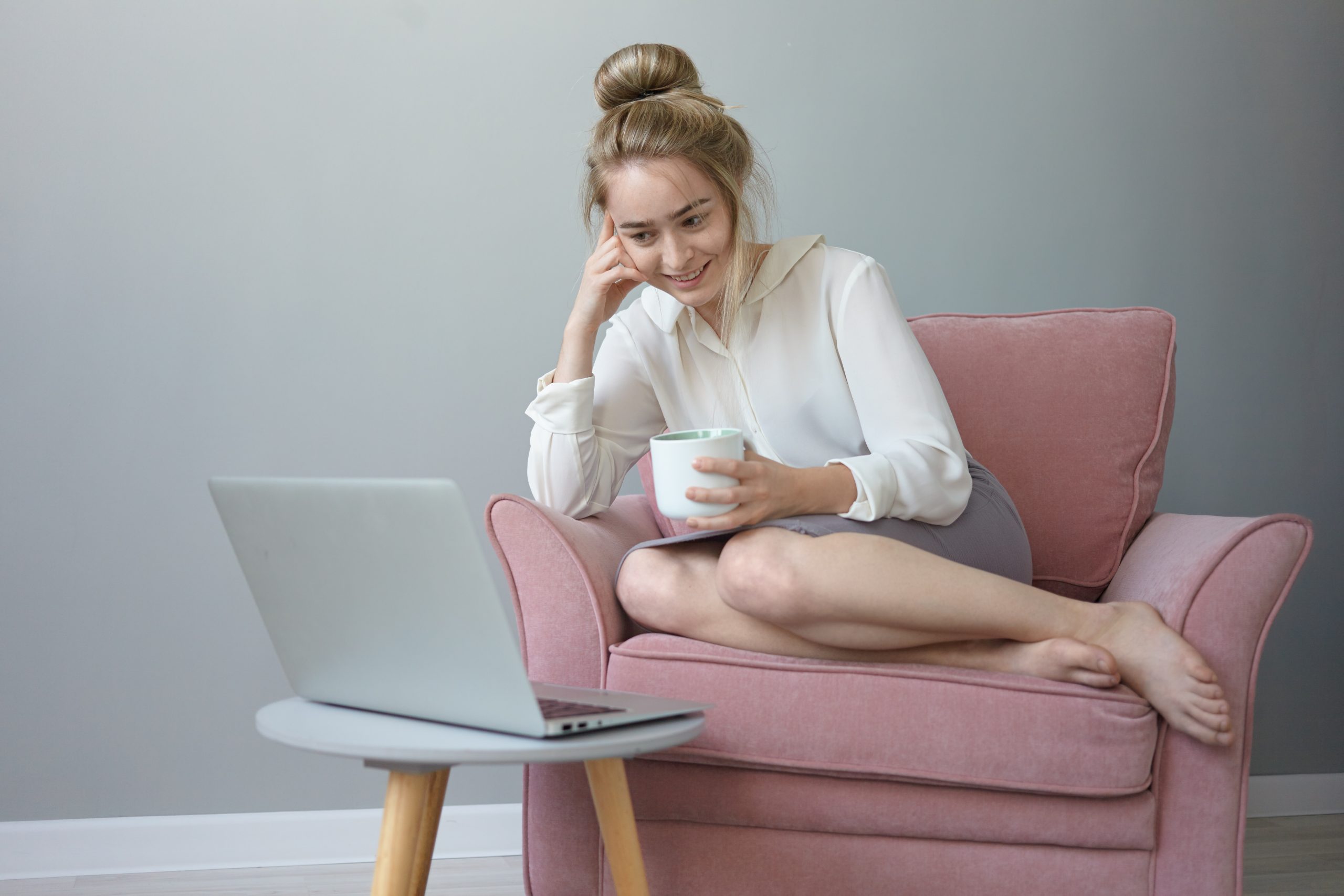 beautiful-cheerful-young-girl with laptop get a mail order bride